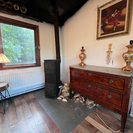 Black House In The Forest With Hot Tube And Theater For Movies Chalet